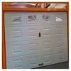 Заводские прямые гаражные ворота с защитой от защемления и окнами