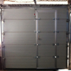 Автоматические гаражные ворота с изоляцией из пенополиуретана и пешеходной дверью